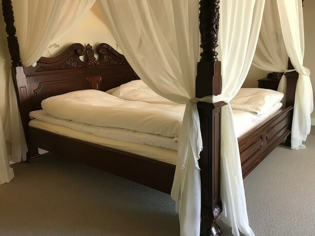 Imagen de la habitación del Hotel Bramslevgaard. Foto 11