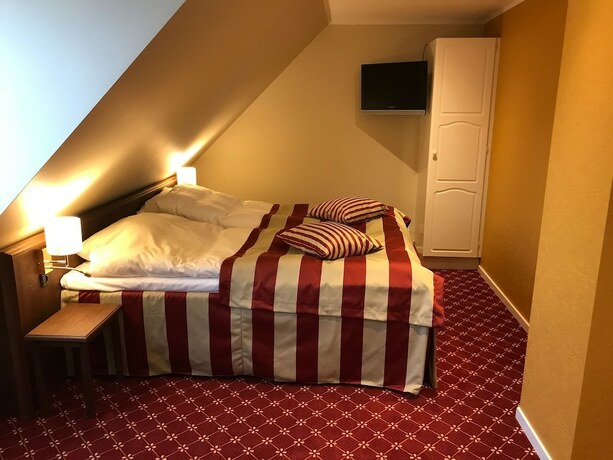 Imagen de la habitación del Hotel Bramslevgaard. Foto 14