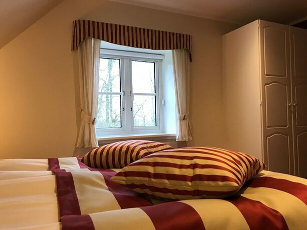 Imagen de la habitación del Hotel Bramslevgaard. Foto 16