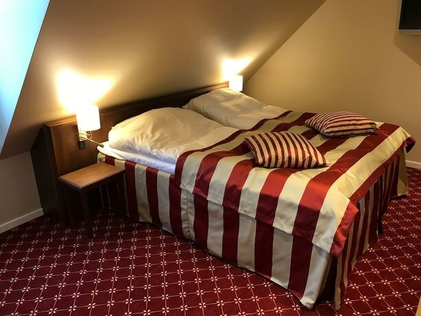 Imagen de la habitación del Hotel Bramslevgaard. Foto 19