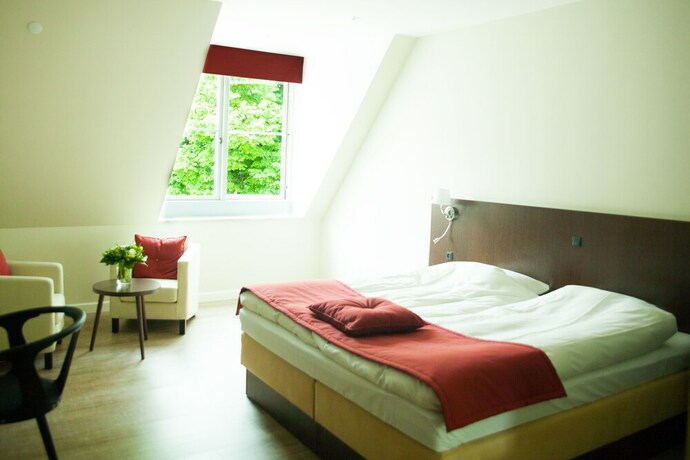 Imagen de la habitación del Hotel Bramslevgaard. Foto 21