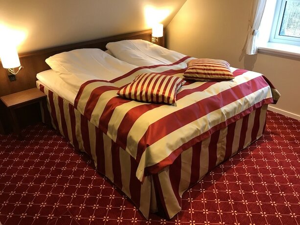 Imagen de la habitación del Hotel Bramslevgaard. Foto 22