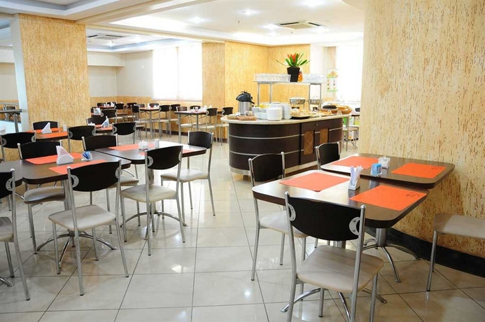 Imagen del bar/restaurante del Hotel Brasília Santana Gold Flat. Foto 5