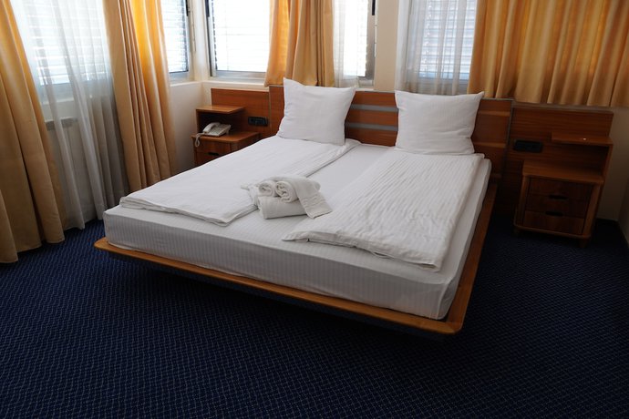 Imagen de la habitación del Hotel Brass. Foto 11