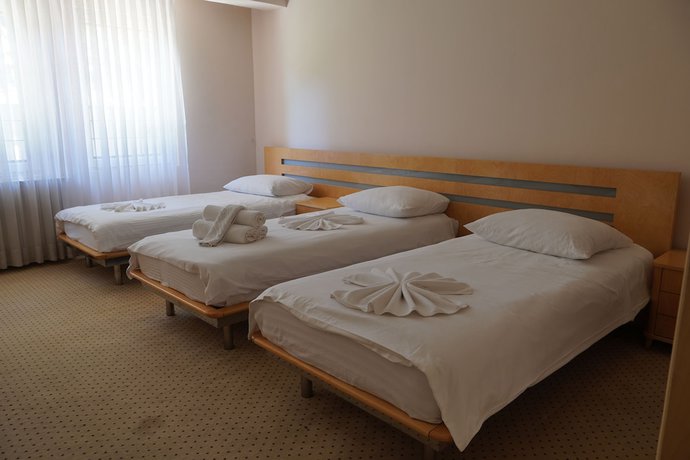 Imagen de la habitación del Hotel Brass. Foto 16