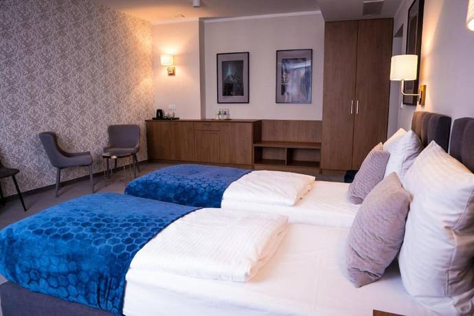 Imagen de la habitación del Hotel Brassel Aparthotel. Foto 7