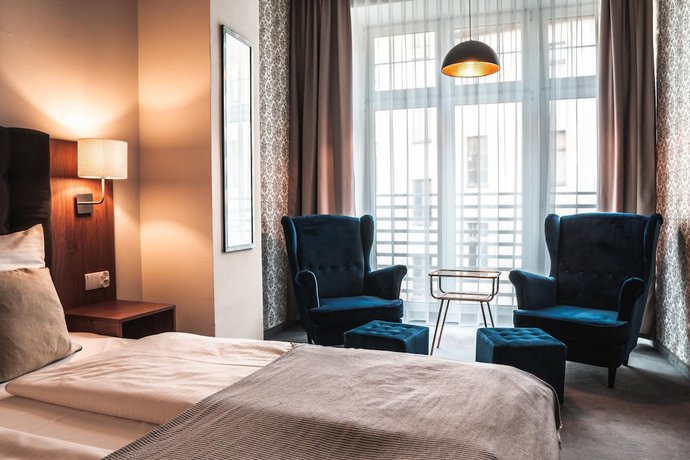 Imagen de la habitación del Hotel Brassel Aparthotel. Foto 10