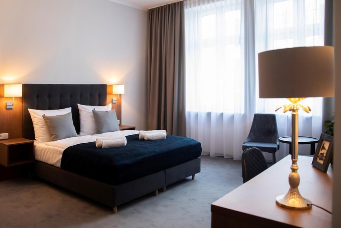 Imagen de la habitación del Hotel Brassel Aparthotel. Foto 14