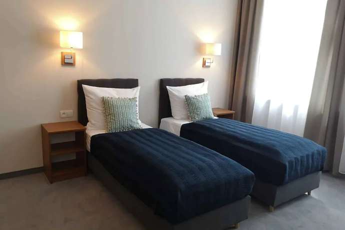 Imagen de la habitación del Hotel Brassel Aparthotel. Foto 16