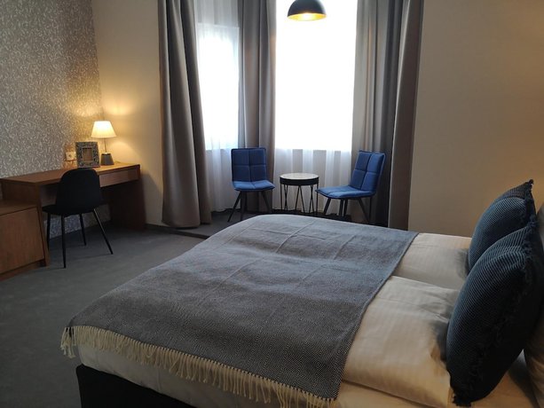 Imagen de la habitación del Hotel Brassel Aparthotel. Foto 18