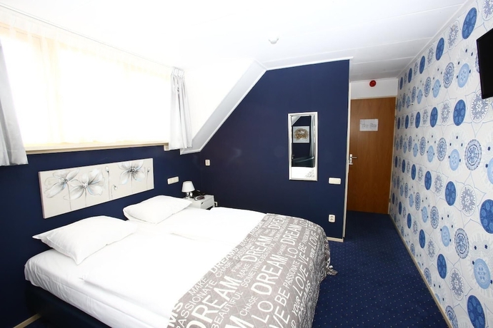 Imagen de la habitación del Hotel Brasserie De Pergola. Foto 13