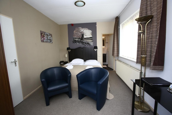 Imagen de la habitación del Hotel Brasserie De Pergola. Foto 16