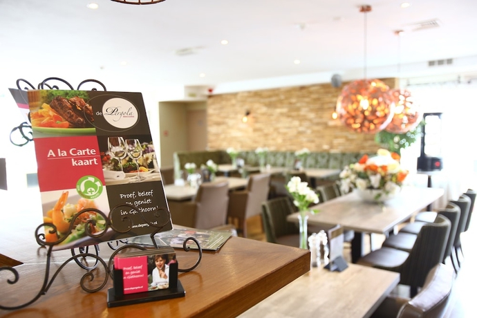 Imagen del bar/restaurante del Hotel Brasserie De Pergola. Foto 2