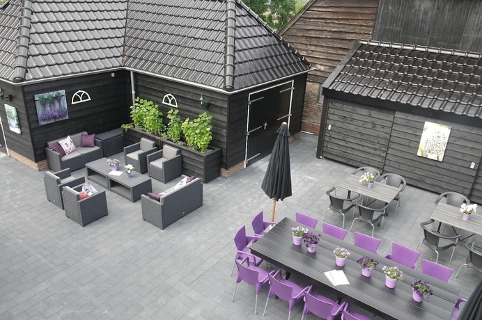 Imagen del bar/restaurante del Hotel Brasserie De Pergola. Foto 8