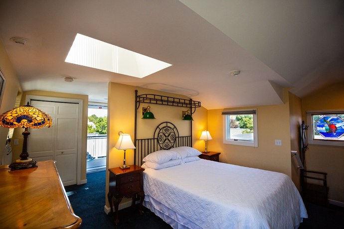 Imagen de la habitación del Hotel Brasswood Inn. Foto 17