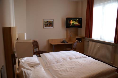 Imagen de la habitación del Hotel Brauerei Keller. Foto 9