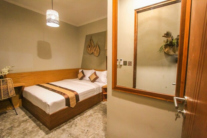 Imagen de la habitación del Hotel Braw Inn Canggu. Foto 21