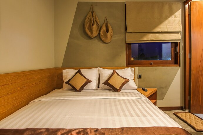 Imagen de la habitación del Hotel Braw Inn Canggu. Foto 22