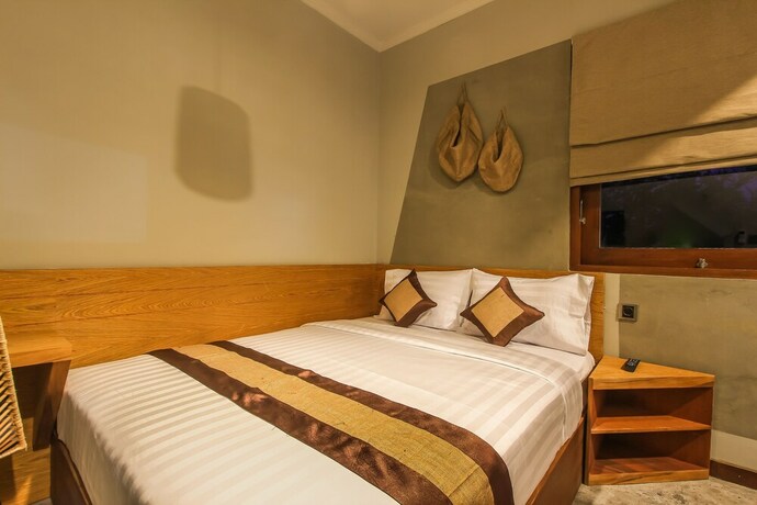 Imagen de la habitación del Hotel Braw Inn Canggu. Foto 26