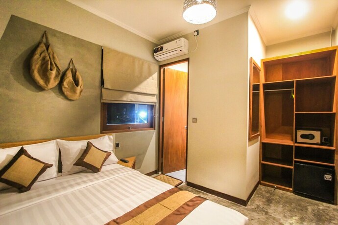 Imagen de la habitación del Hotel Braw Inn Canggu. Foto 32
