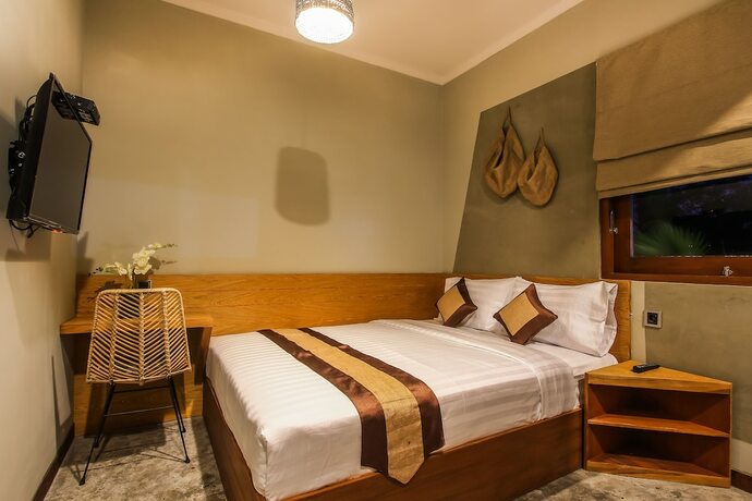 Imagen de la habitación del Hotel Braw Inn Canggu. Foto 36
