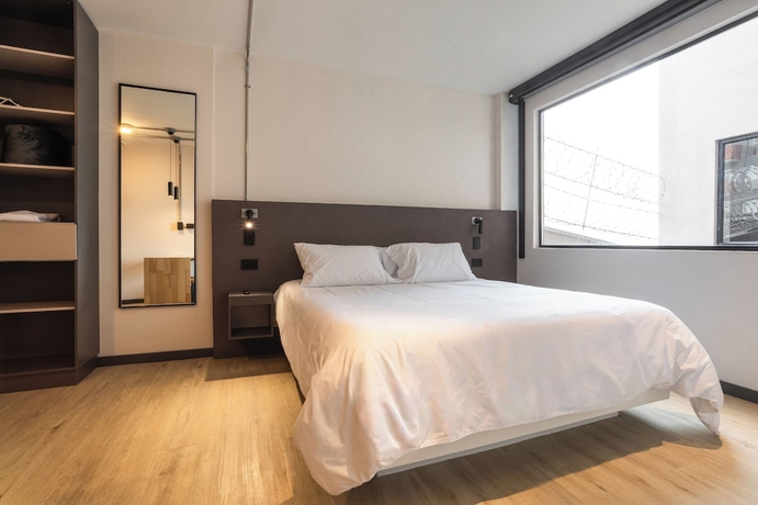 Imagen de la habitación del Hotel Break Estudios Manizales. Foto 4
