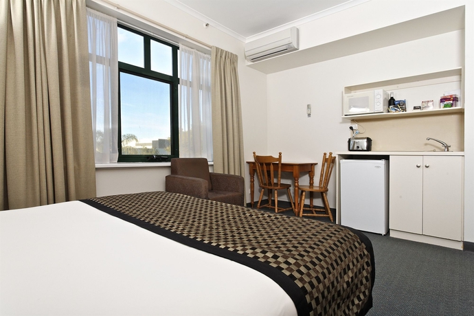 Imagen de la habitación del Hotel BreakFree Directors Studio. Foto 6