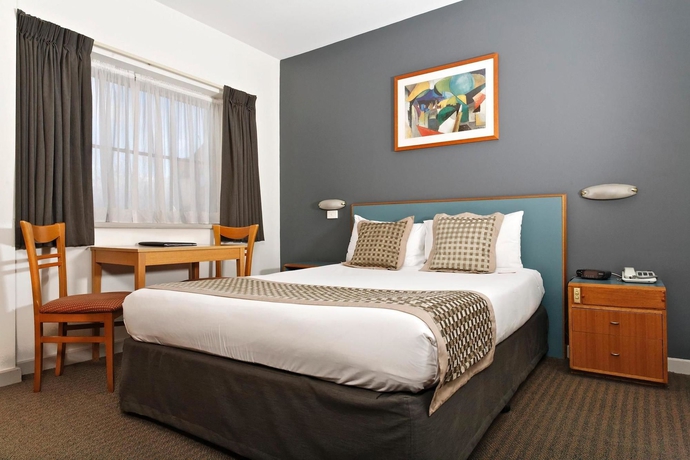 Imagen de la habitación del Hotel BreakFree Directors Studio. Foto 11