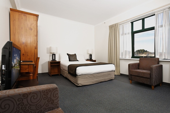 Imagen de la habitación del Hotel BreakFree Directors Studio. Foto 14