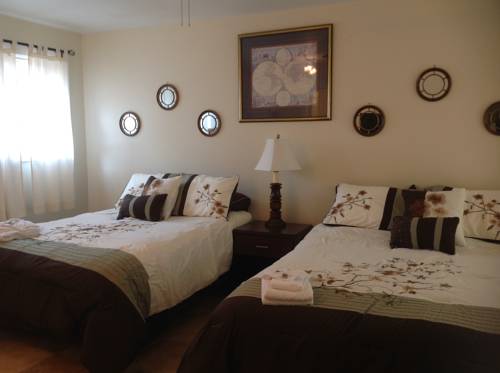 Imagen de la habitación del Hotel Breakers By The Sea. Foto 10