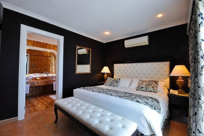 Imagen de la habitación del Hotel Breakfast At Monaco. Foto 8