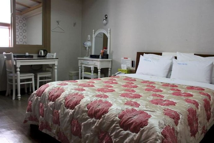 Imagen de la habitación del Hotel Breakfast at Tiffany\'s Motel. Foto 12