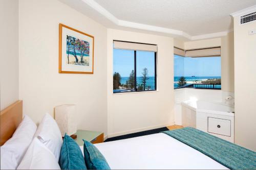 Imagen de la habitación del Hotel Breakfree Grand Pacific Resort. Foto 9