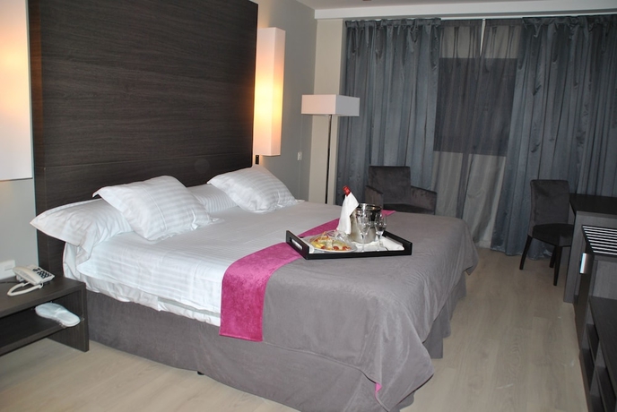 Imagen de la habitación del Hotel Brea's. Foto 11