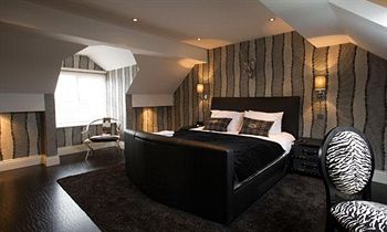 Imagen de la habitación del Hotel Breck Apartments. Foto 8