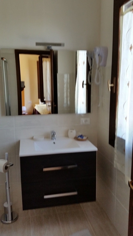 Imagen de la habitación del Hotel Bredina. Foto 9