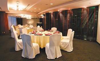 Imagen del bar/restaurante del Hotel Breezbay Resort And Spa. Foto 6