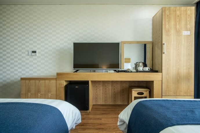 Imagen de la habitación del Hotel Breeze Bay. Foto 14