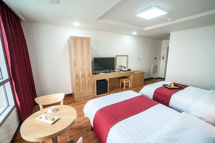 Imagen de la habitación del Hotel Breeze Bay. Foto 16