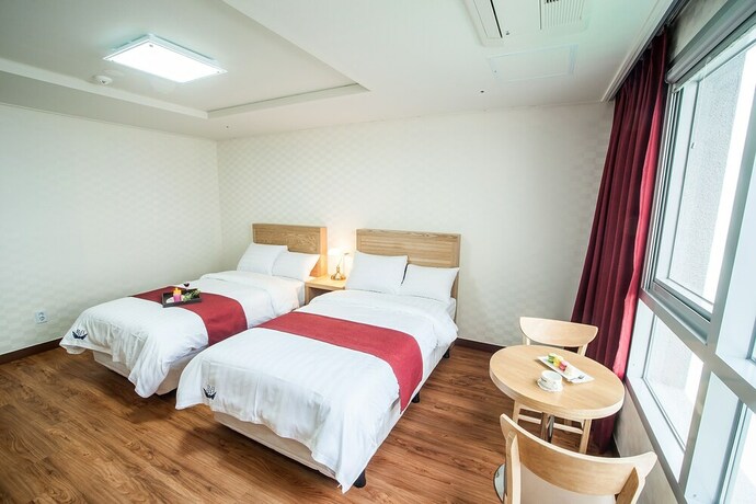 Imagen de la habitación del Hotel Breeze Bay. Foto 19