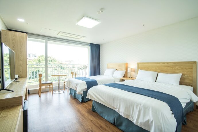 Imagen de la habitación del Hotel Breeze Bay. Foto 25