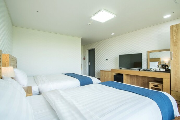 Imagen de la habitación del Hotel Breeze Bay. Foto 26