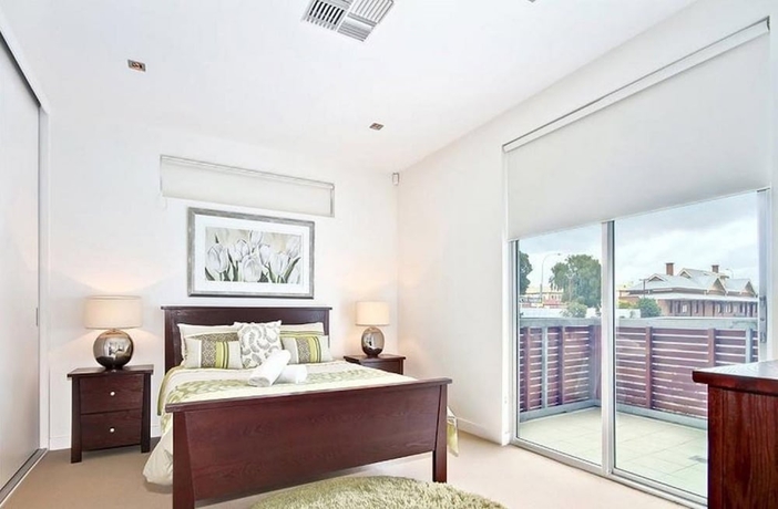 Imagen de la habitación del Hotel Breeze Beachfront Apartments. Foto 9