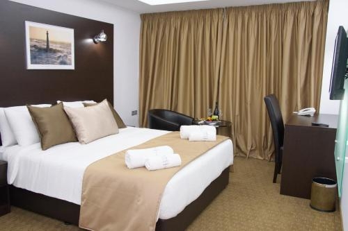 Imagen de la habitación del Hotel Breeze Boutique. Foto 9