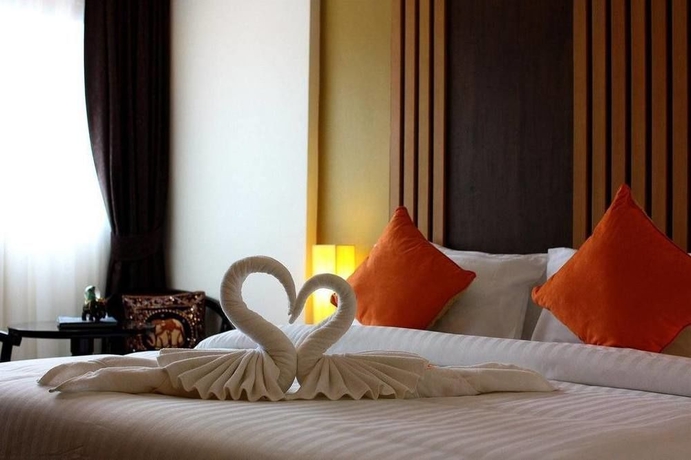 Imagen de la habitación del Hotel Breezotel. Foto 14