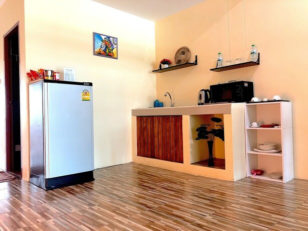 Imagen de la habitación del Hotel Breezy House Jomtien. Foto 23