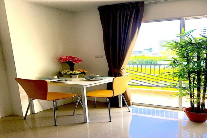 Imagen de la habitación del Hotel Breezy Room Jomtien. Foto 26