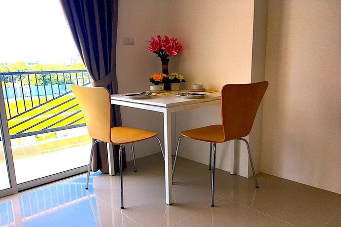 Imagen de la habitación del Hotel Breezy Room Jomtien. Foto 30