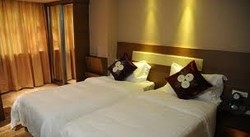 Imagen de la habitación del Hotel Bremen Holiday Harbin. Foto 4