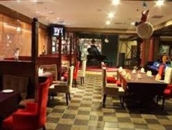 Imagen del bar/restaurante del Hotel Bremen Holiday Harbin. Foto 3